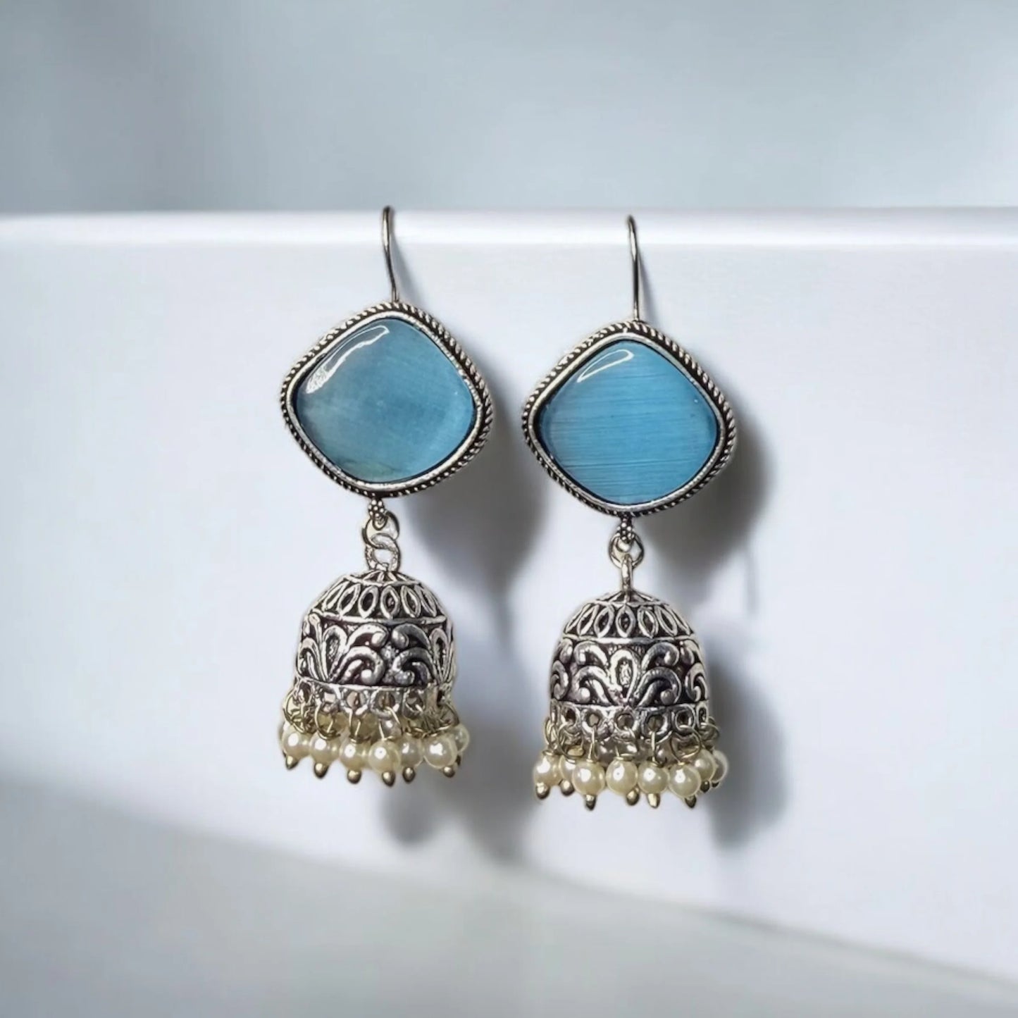 Silver-Plated Jhumka Earrings with Blue Stone Top and Pearl Danglers – Elegant Ethnic Jewelry