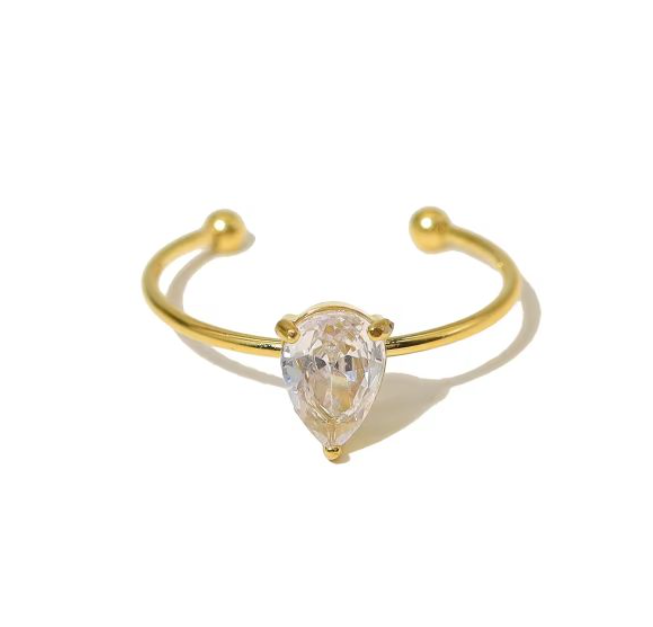 Gold Cuff Ring with Pear-Shaped Crystal (White) – Elegant and Modern Design (Adjustable Size)