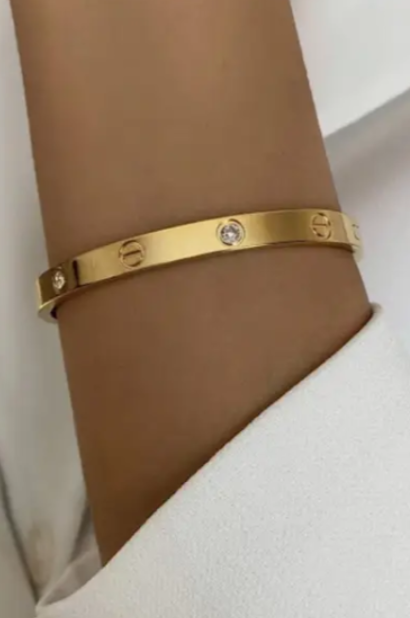 Gold Bangle with Diamond Details - Sleek Design with Elegant Accents