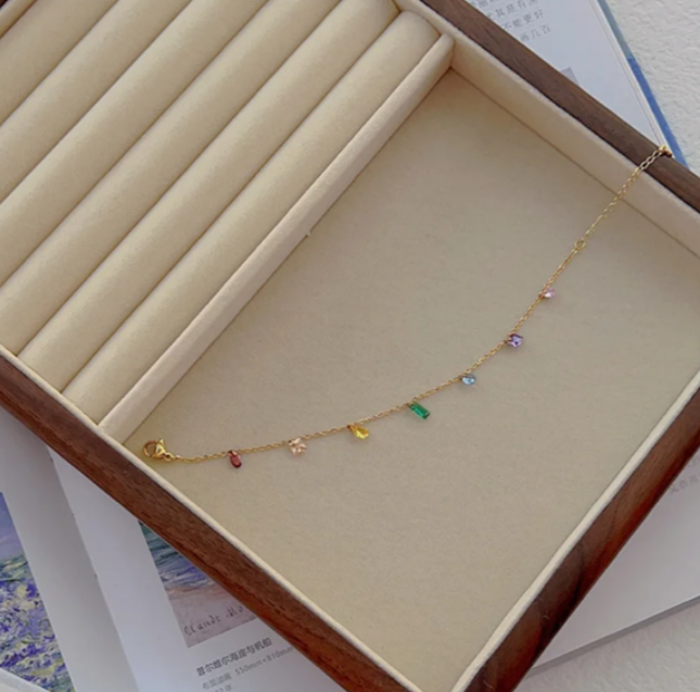 Gold Bracelet with Multi-Colored Gemstones – Elegant and Vibrant Design