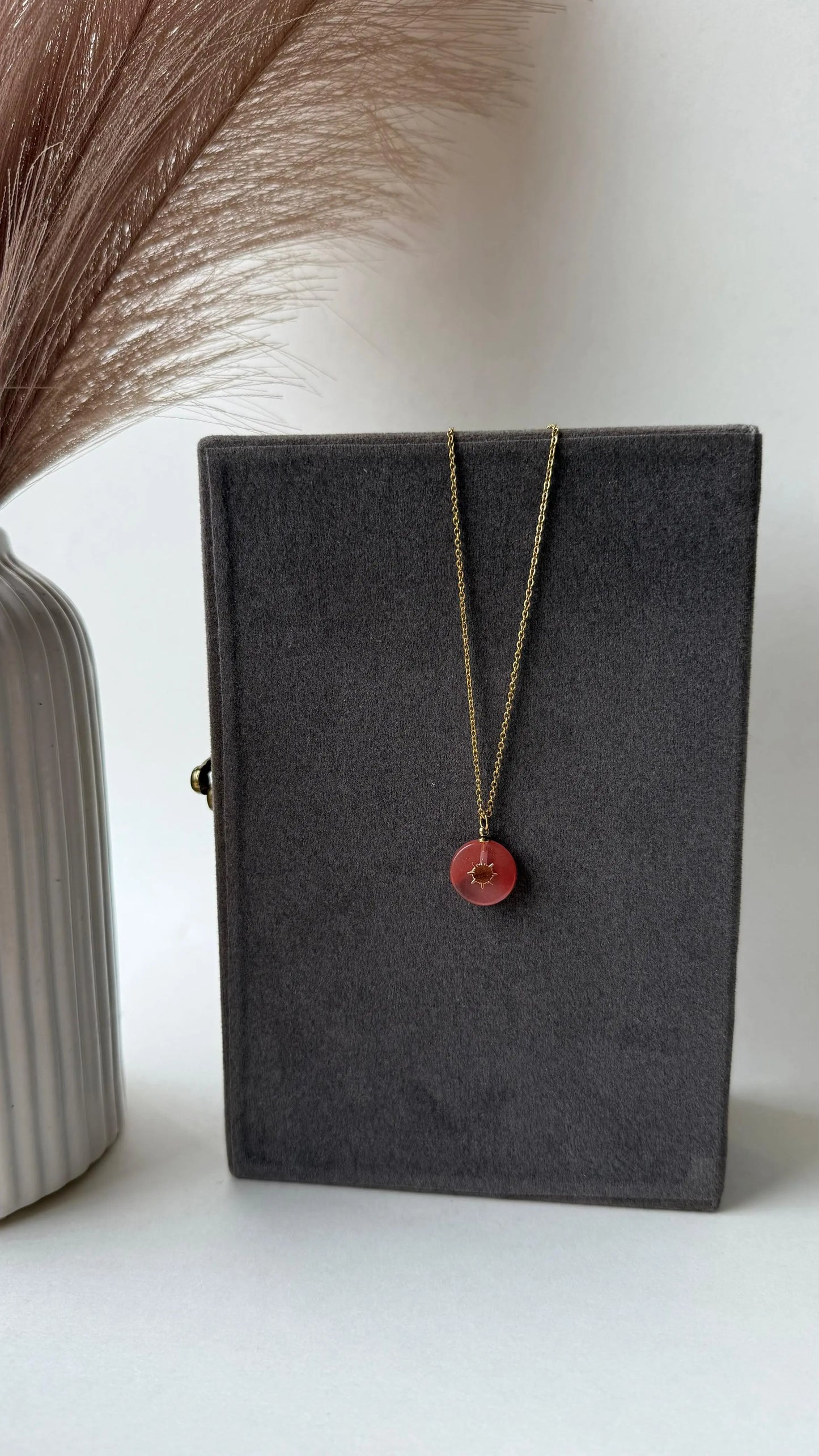 Elegant Gold-Plated Necklace with Pink Sunburst Pendant