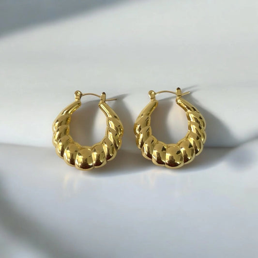 Bold twisted gold-tone hoop earrings