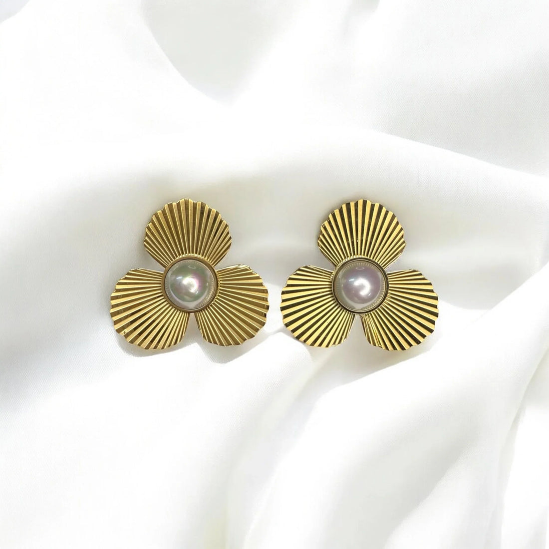 Gold floral pearl stud earrings