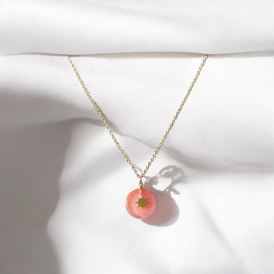 Elegant Gold-Plated Necklace with Pink Sunburst Pendant