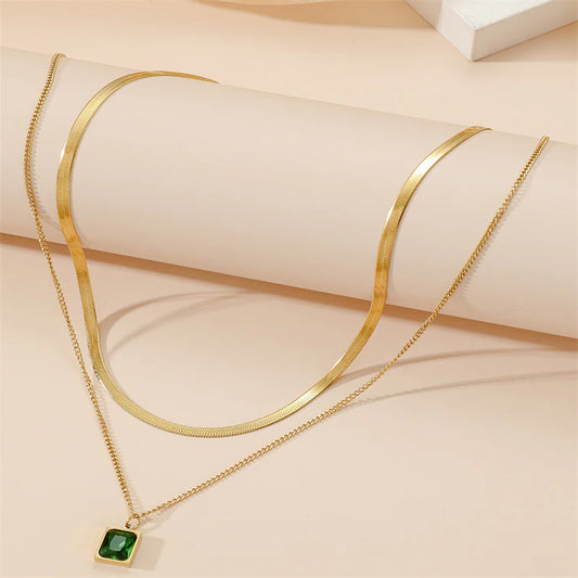 Gold Layered Necklace Set – Elegant Snake Chain with Green Gem Pendant