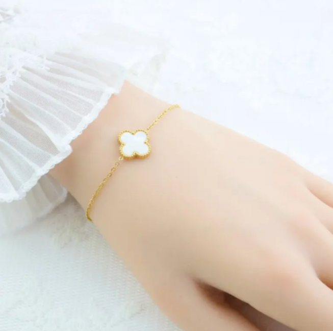 Reversible Gold Bracelet with Mother of Pearl and Black Clover Charm