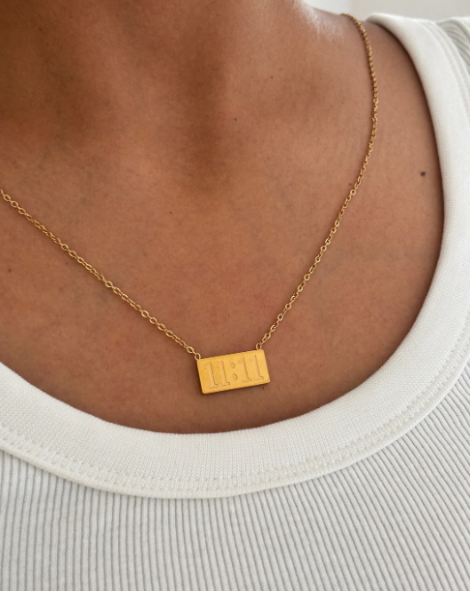 Gold 11:11 pendant necklace with a minimalist design — alternate view