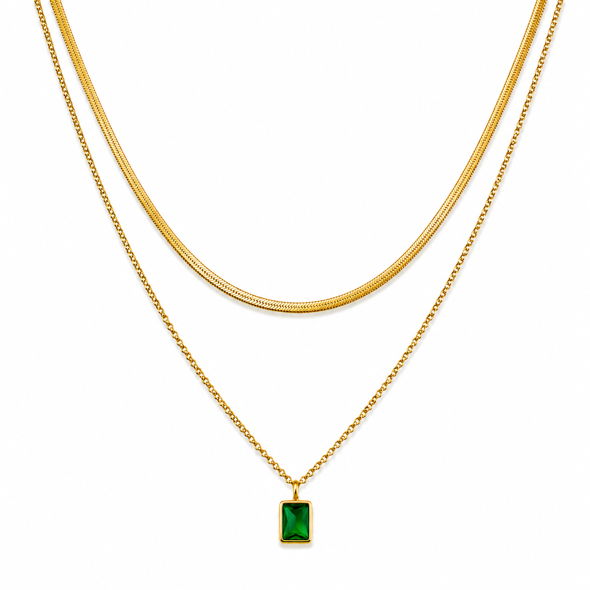 Gold layered necklace set with snake chain and green gem pendant