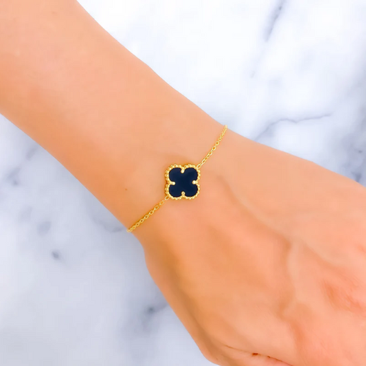 Reversible Gold Bracelet with Mother of Pearl and Black Clover Charm